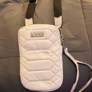 Adjustable sporty crossbody purse great for traveling, or on the go.